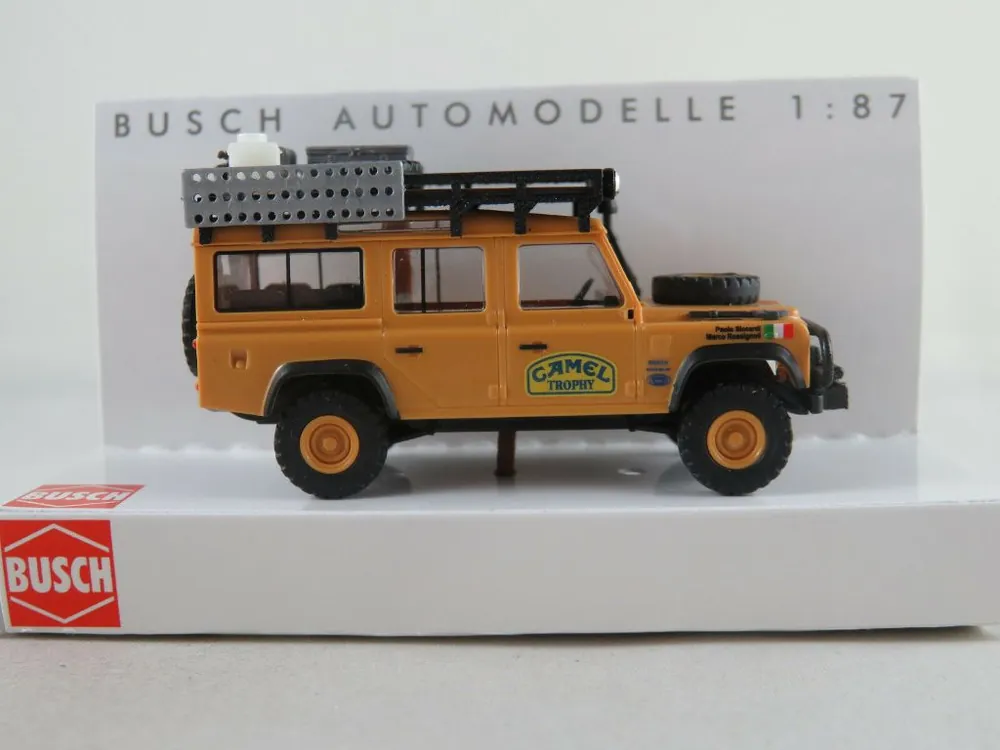 50371 Busch HO scala 1 87 Land Rover Defender Camel Trophy Italia 1983 Prezzo Ridotto